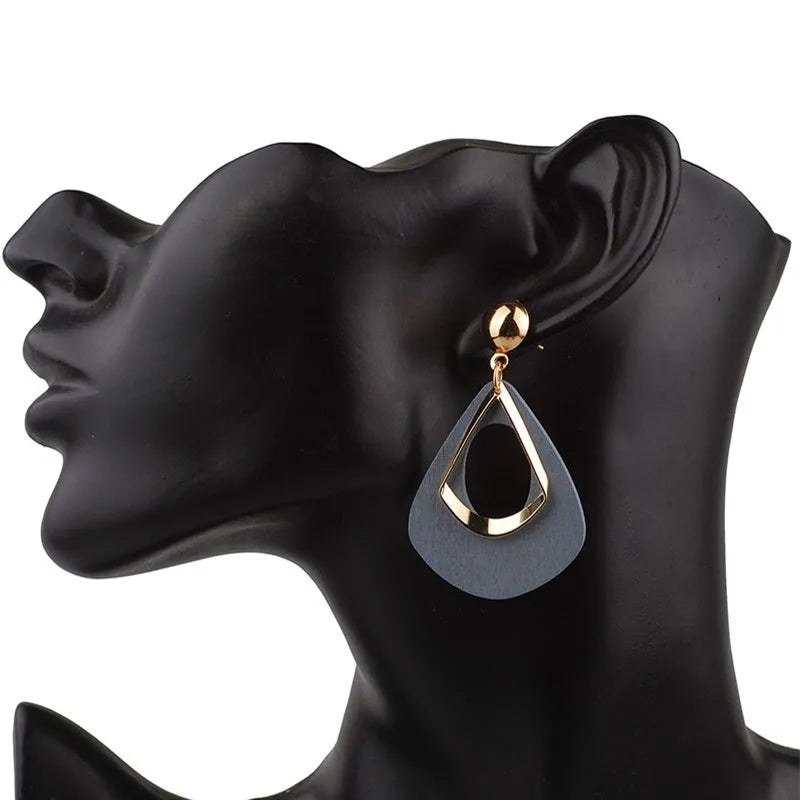 Women's elegant wooden teardrop earrings, handmade with natural charm, lightweight and unique statement jewelry.