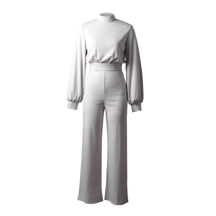Comfortable women's elegant jumpsuit, high collar, long sleeve. A versatile piece for effortless chic and style.