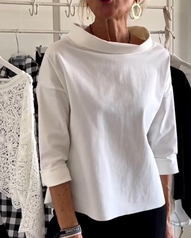 Elegant women's high-collar long-sleeve top, versatile for casual or formal wear. Comfortable and stylish blouse.
