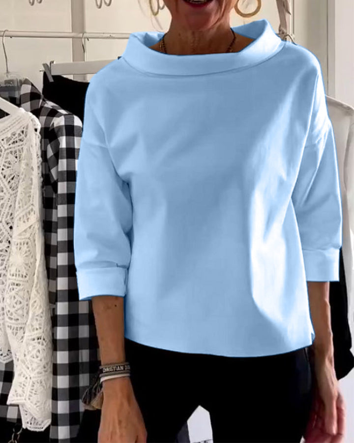 Women's casual high-collar long-sleeve top, elegant and comfortable for everyday wear. Fashionable blouse.