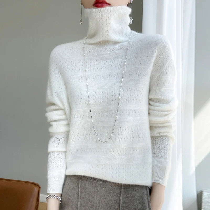 Warm women's high-collar sweater, perfect for cold winter days. Stylish & comfortable long-sleeve pullover.