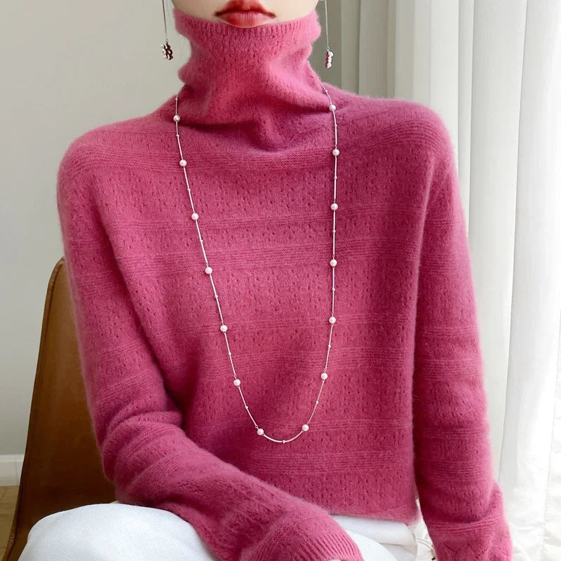 Fashionable women's high-collar pullover sweater. Elegant long-sleeve knit for ultimate winter comfort & style.
