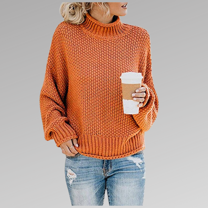 Elegant women's high neck long sleeve sweater. Chic winter wear offering cozy comfort and versatile style.