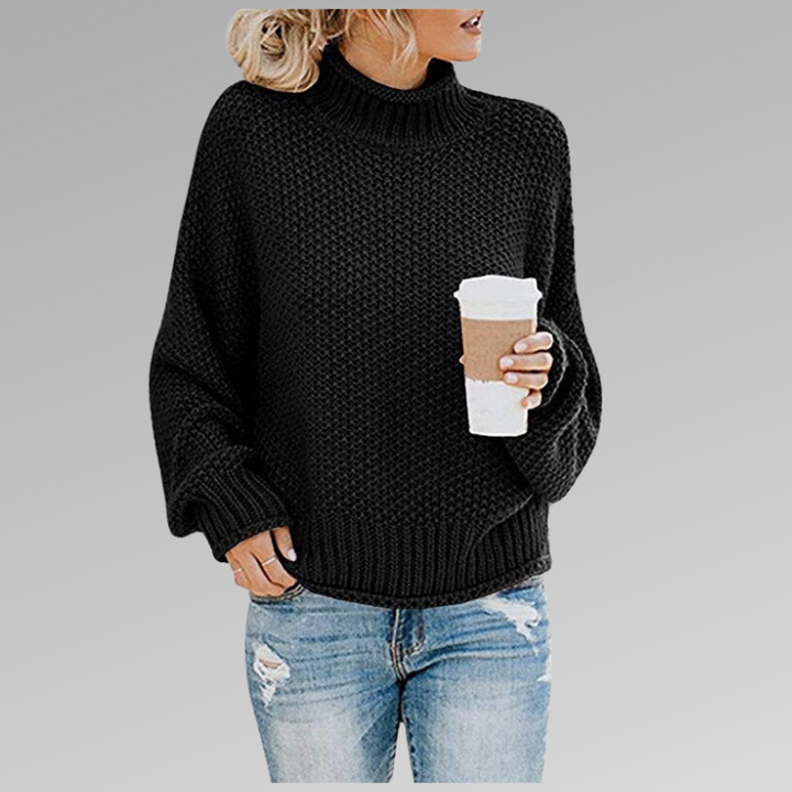 Cozy women's high neck long sleeve sweater. Elegant top providing warmth and comfort for cold weather.