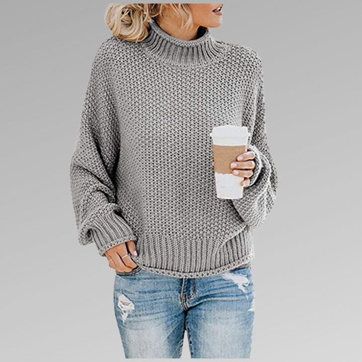 Warm & elegant women's sweater. Chic, cozy high neck top for stylish winter fashion & effortless comfort.