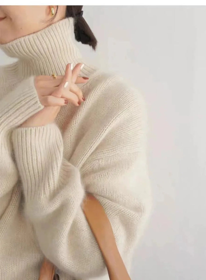 Luxurious comfort women's high-neck sweater, soft and warm, ideal for elegant layering in fall & winter.