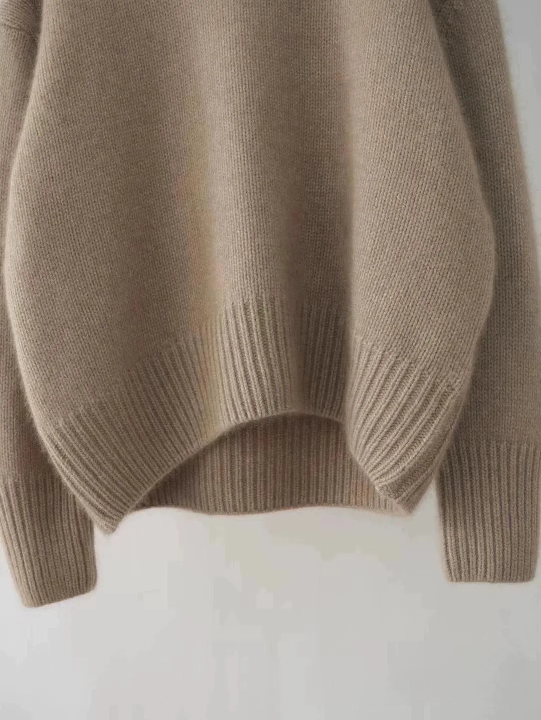 Soft feel women's turtleneck sweater, a versatile piece for elegant everyday wear & modern winter fashion.