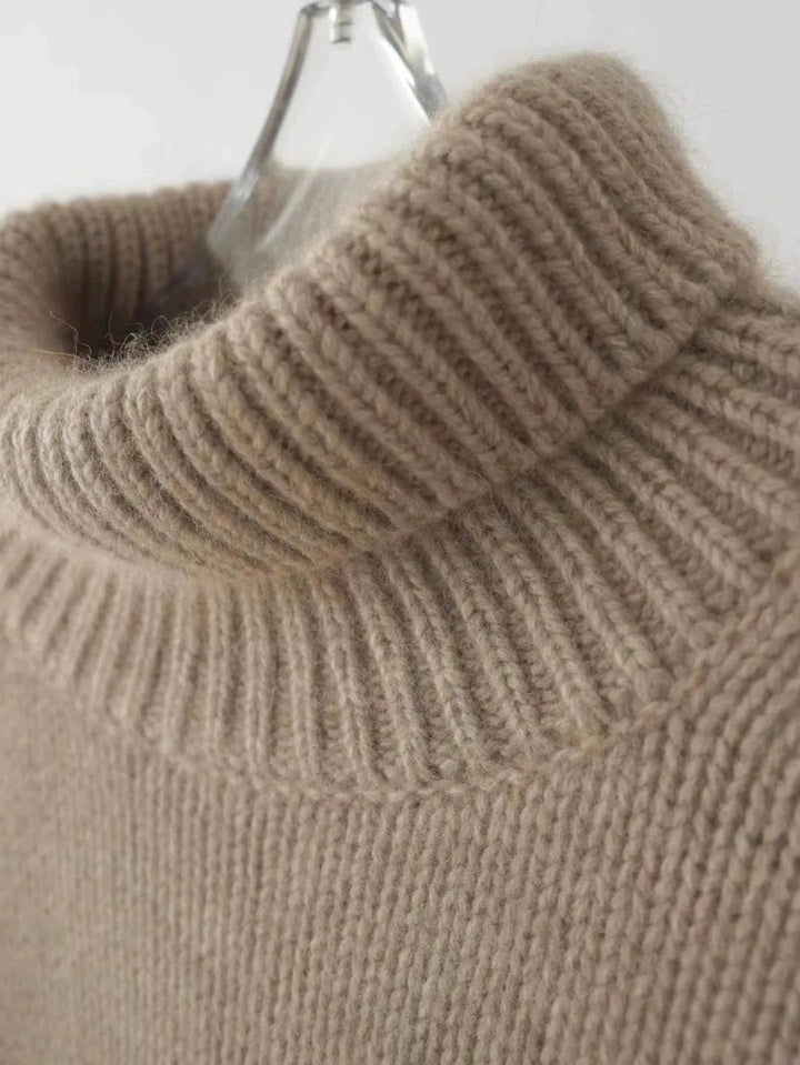 Warm women's high-neck sweater for comfortable layering; classic apparel with a cozy, soft feel for cold days.