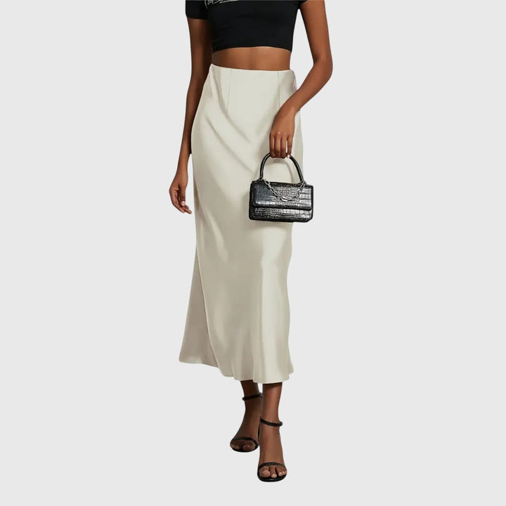 Chic women's high-waist long slip skirt with a bias cut, versatile for elegant going out looks.