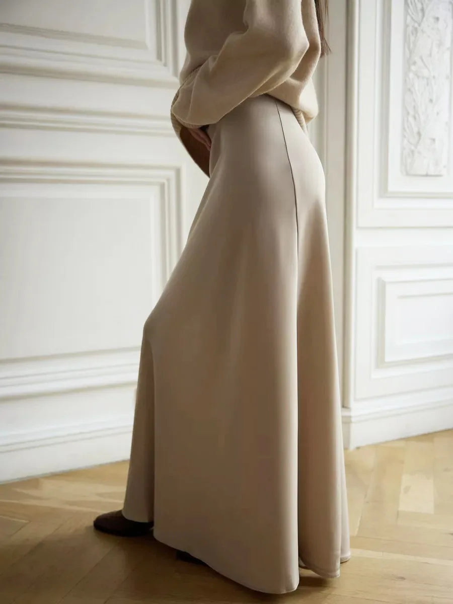 Women's elegant long skirt, high waist and a glamorous fishtail hem.