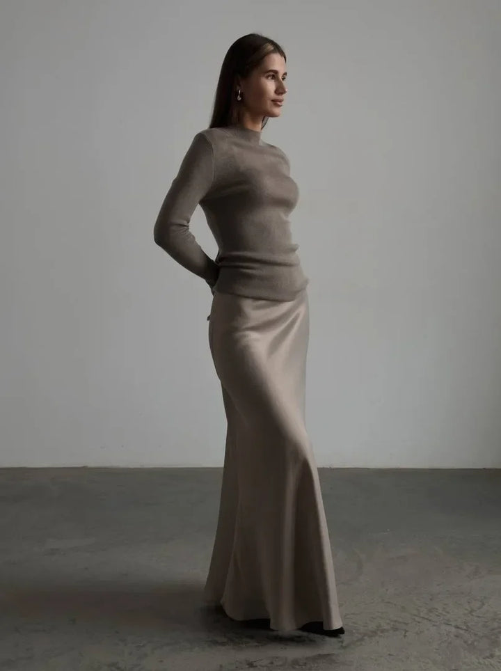 Women's high waist maxi skirt with a luxurious fishtail hem.