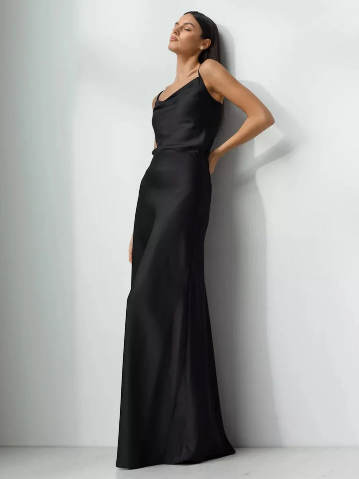 Women's elegant high waist maxi skirt with a dramatic fishtail hem.