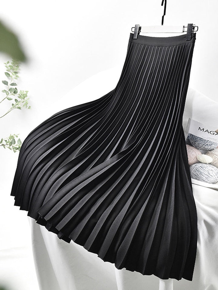 Chic women's high waist pleated skirt for versatile styling. Perfect elegant midi for summer fashion & formal wear.
