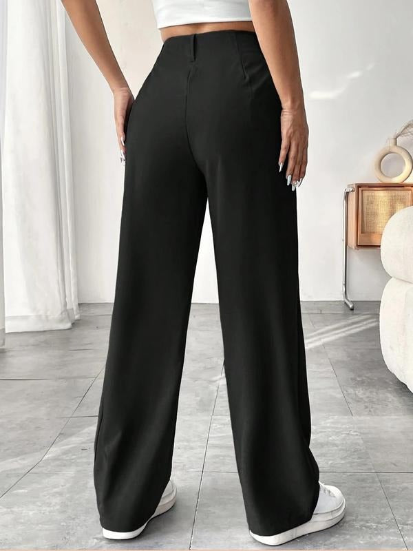 Sophisticated women's tailored high-waist trousers with a modern wide-leg silhouette, great for office wear.