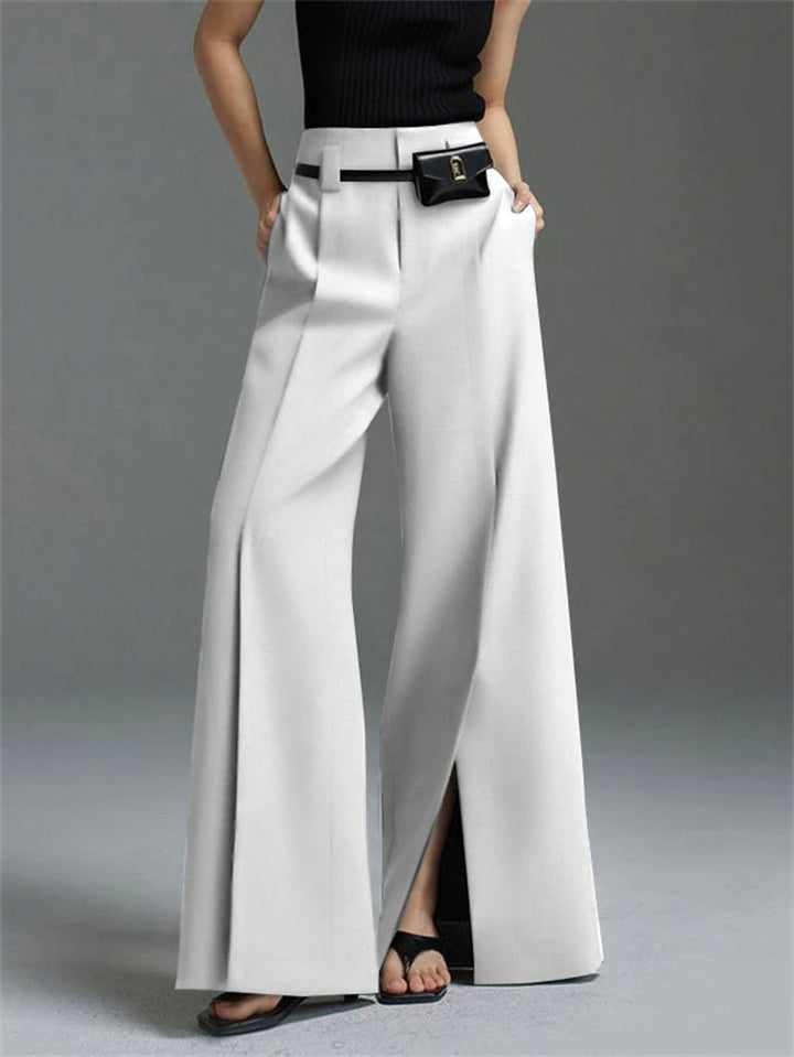 Elegant women's high-waist wide-leg trousers with pleated detail, perfect for office wear or a chic casual look.