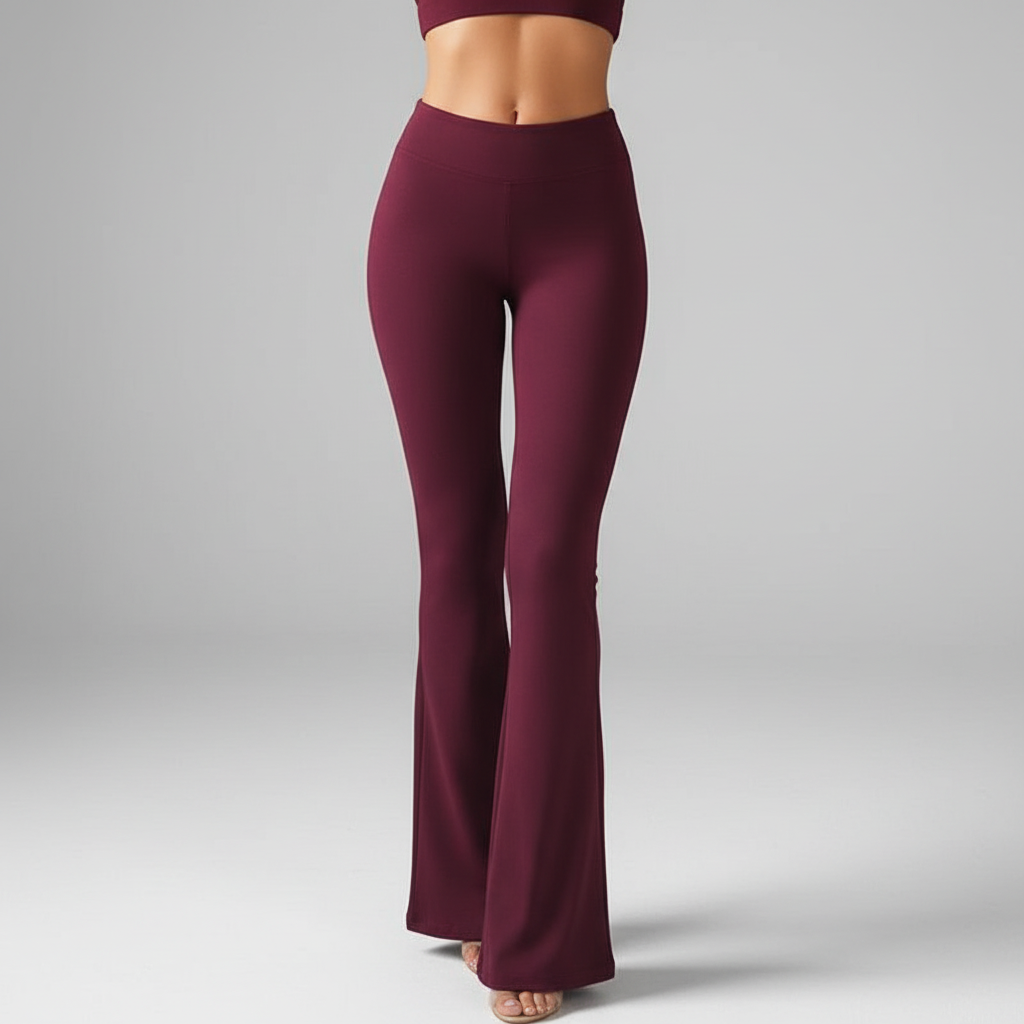 Annika women's high-waisted flared trousers in motion, emphasizing their elegant drape
