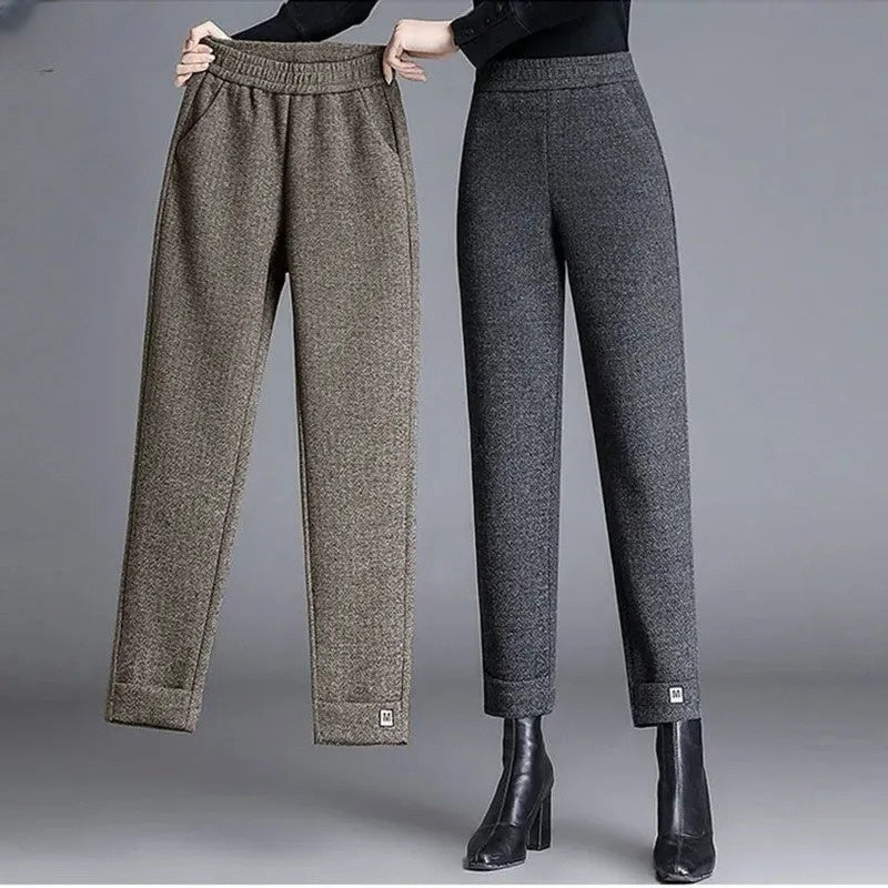 Women's classic herringbone pattern tailored trousers, offering an elegant style for both work and daily wear.