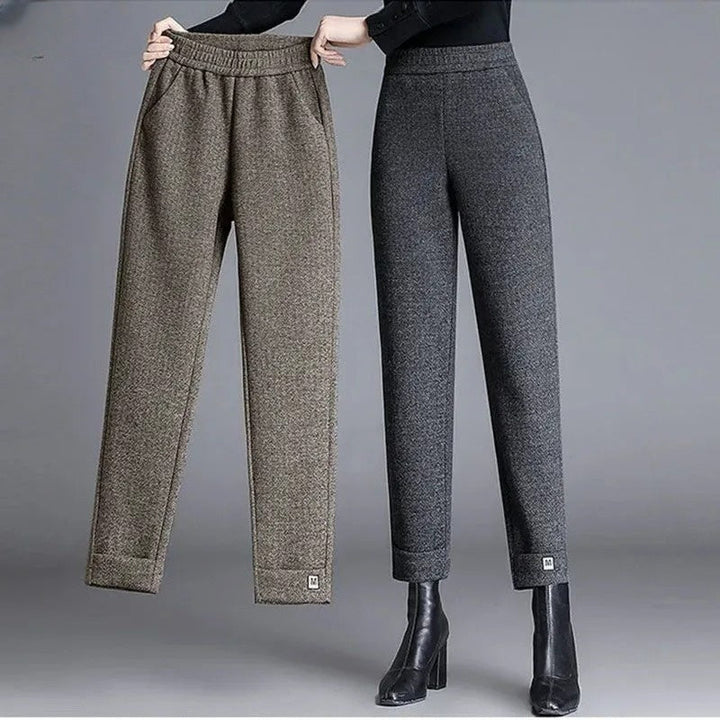 Women's classic herringbone pattern tailored trousers, offering an elegant style for both work and daily wear.