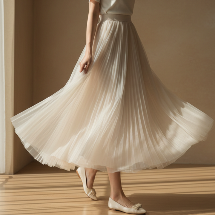 Chic women's high-waisted A-line pleated midi skirt, a versatile choice for workwear or elegant office attire.