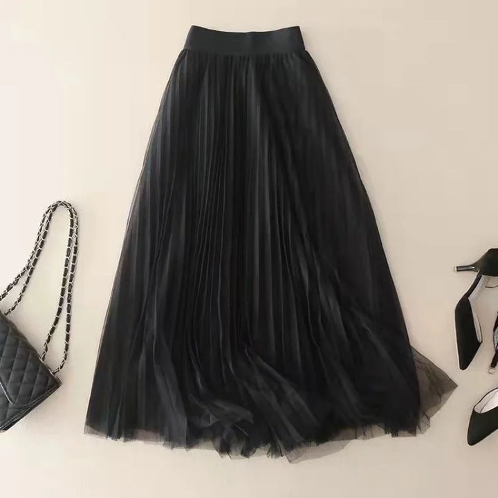 Beautiful women's high-waisted A-line pleated midi skirt, offering elegant style and comfort for any occasion.