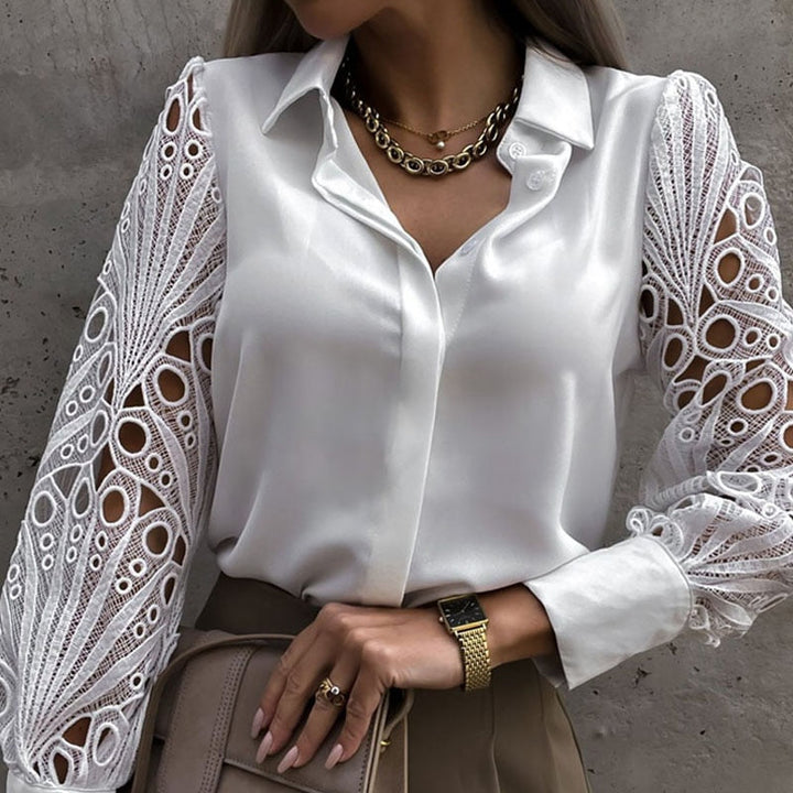 Women's elegant hollow out long sleeve blouse, a chic and stylish top perfect for fashion-forward outfits.