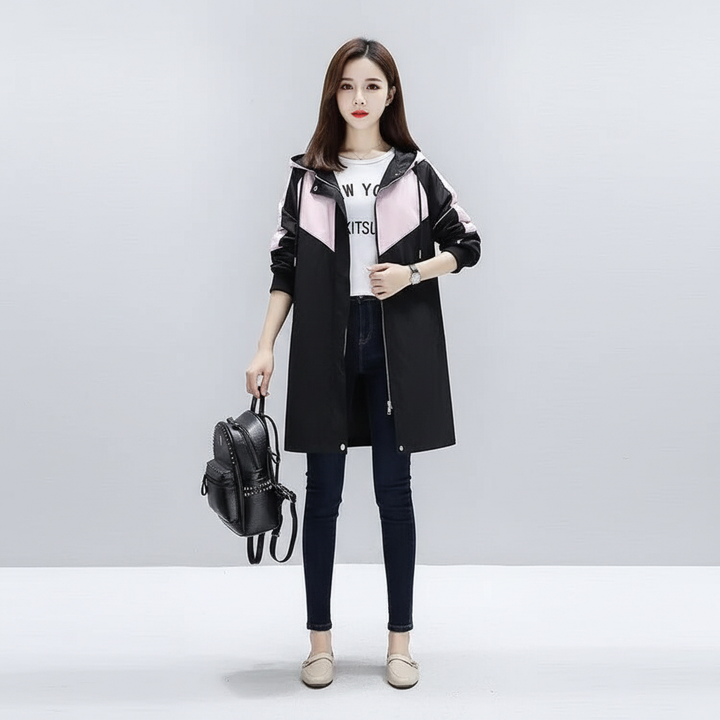 Classic women's mid-length trench coat with a hood, offering both style and comfort for transitional seasons