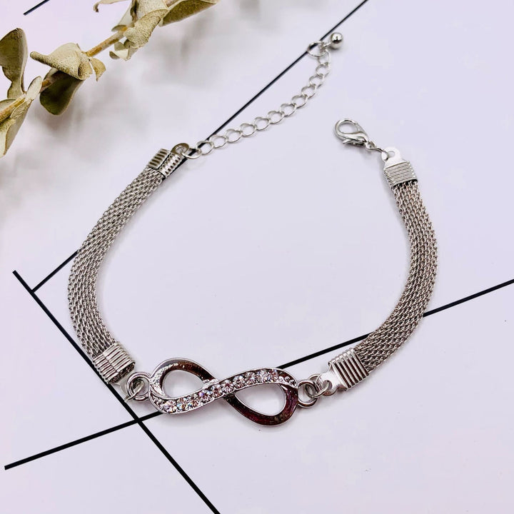 Beautiful crystal infinity bracelet for women, an elegant silver jewelry gift for her. Timeless and adjustable.