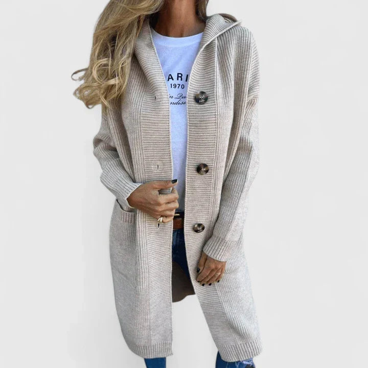 Cozy open-front women's knit cardigan with long sleeves & practical pockets, ideal for spring fashion.