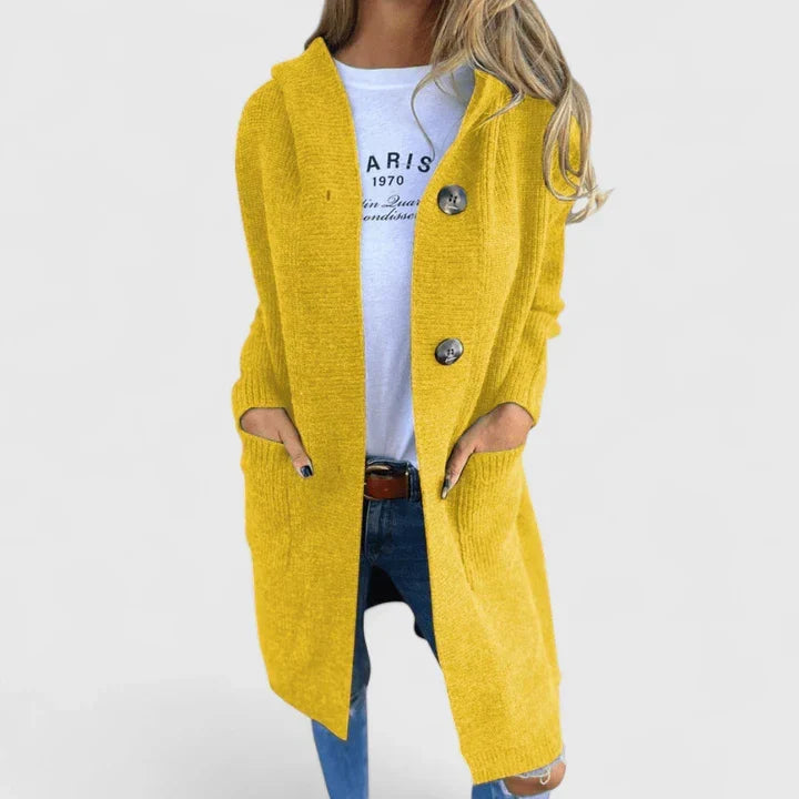 Soft knit women's cardigan, an elegant long-sleeve top with pockets, perfect for cozy spring fashion.