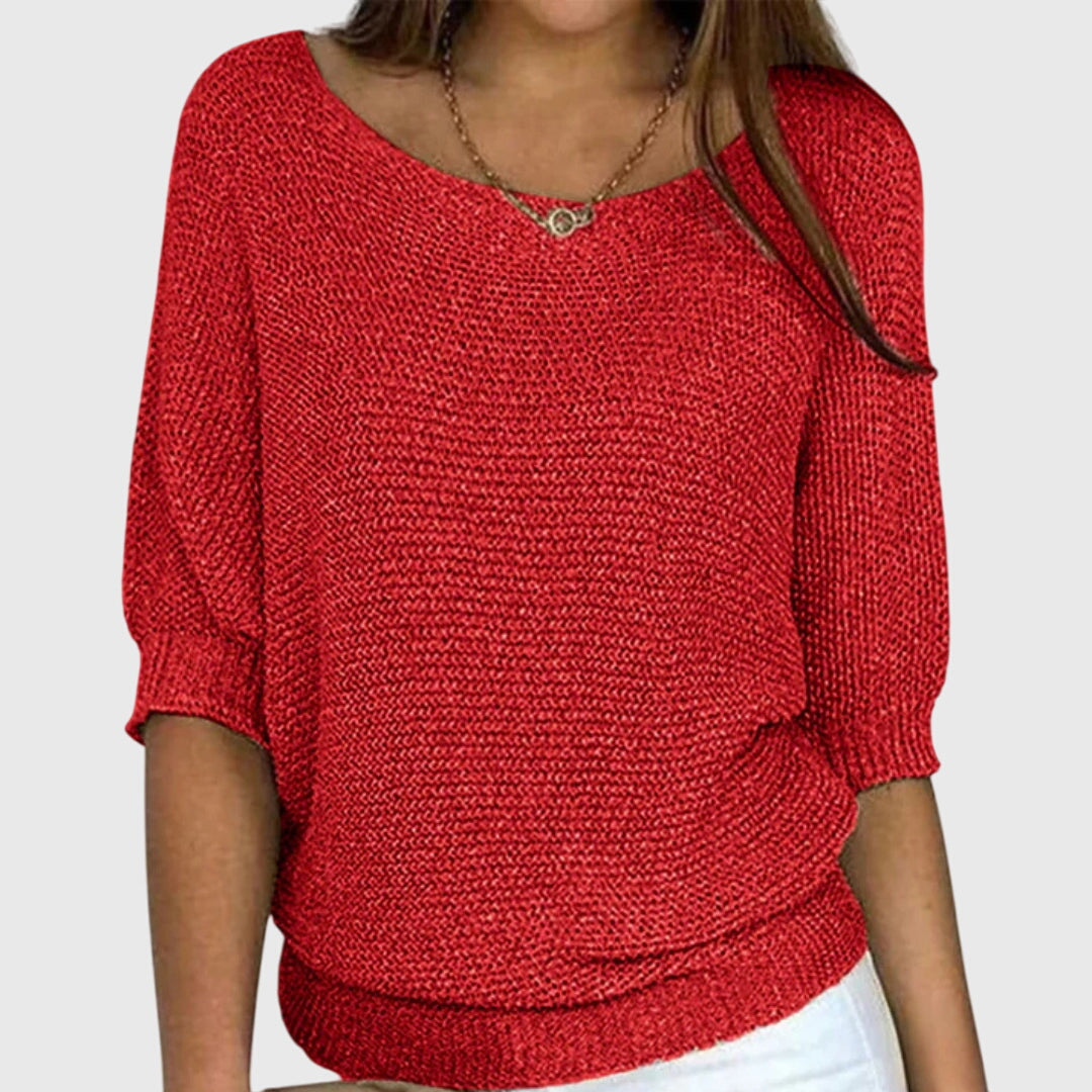Elegant women's knit sweater, perfect for all seasons. Soft, comfortable knitwear with a flattering fit.