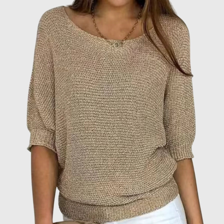 Versatile women's elegant knit sweater, ideal for casual chic looks. A stylish all-season wardrobe staple.