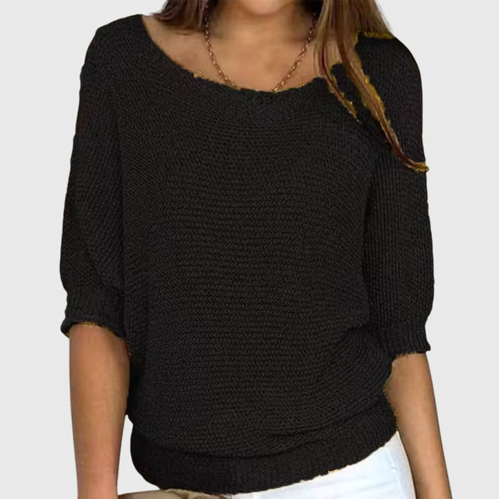 Comfortable women's elegant knit sweater with a flattering fit. Soft knitwear for versatile all-season wear.