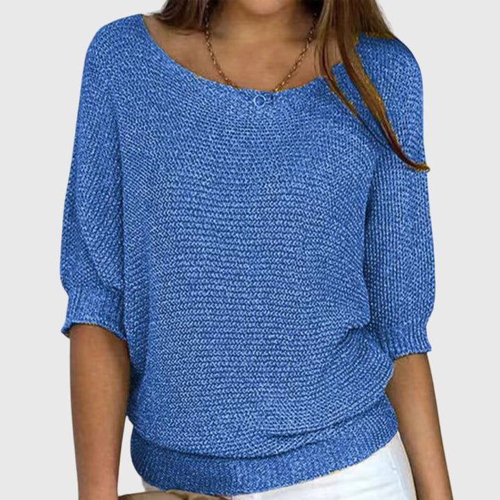 Flattering women's elegant knit sweater, a comfortable all-season wardrobe staple. Perfect for casual chic style.