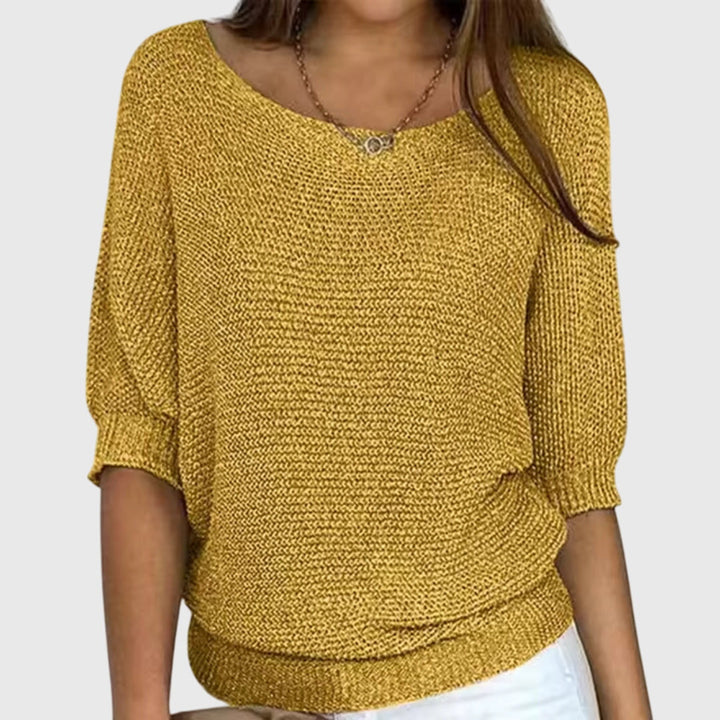 Sophisticated women's elegant knitwear. This all-season sweater offers a comfortable, versatile and chic design.