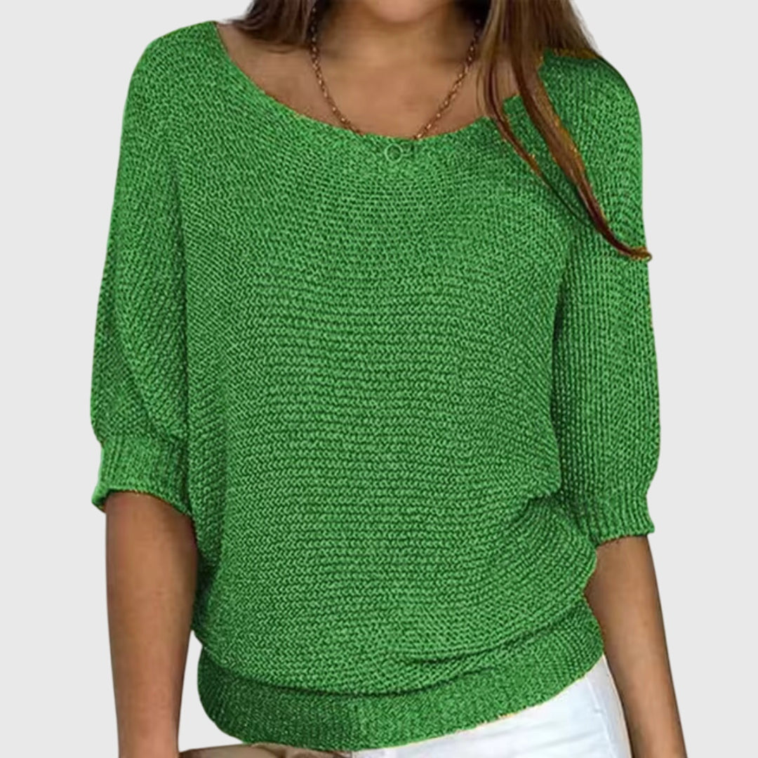 Chic women's knit sweater, featuring an elegant design and flattering fit. Ideal for versatile, all-season fashion.