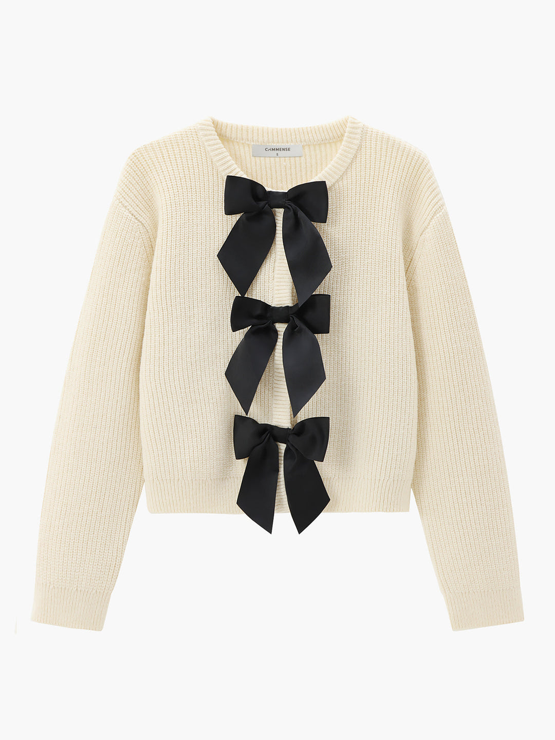 Elegant women's knit sweater with chic bow detail, perfect for stylish fall and winter fashion.