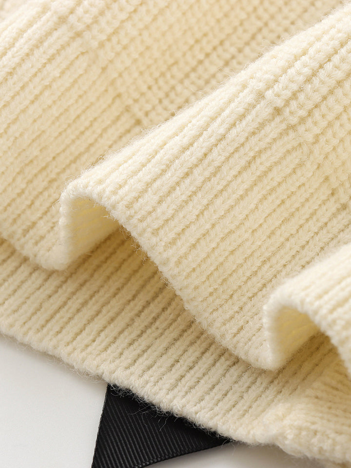 Soft women's elegant bow detail sweater, a cozy long sleeve knit jumper for stylish fall/winter comfort.