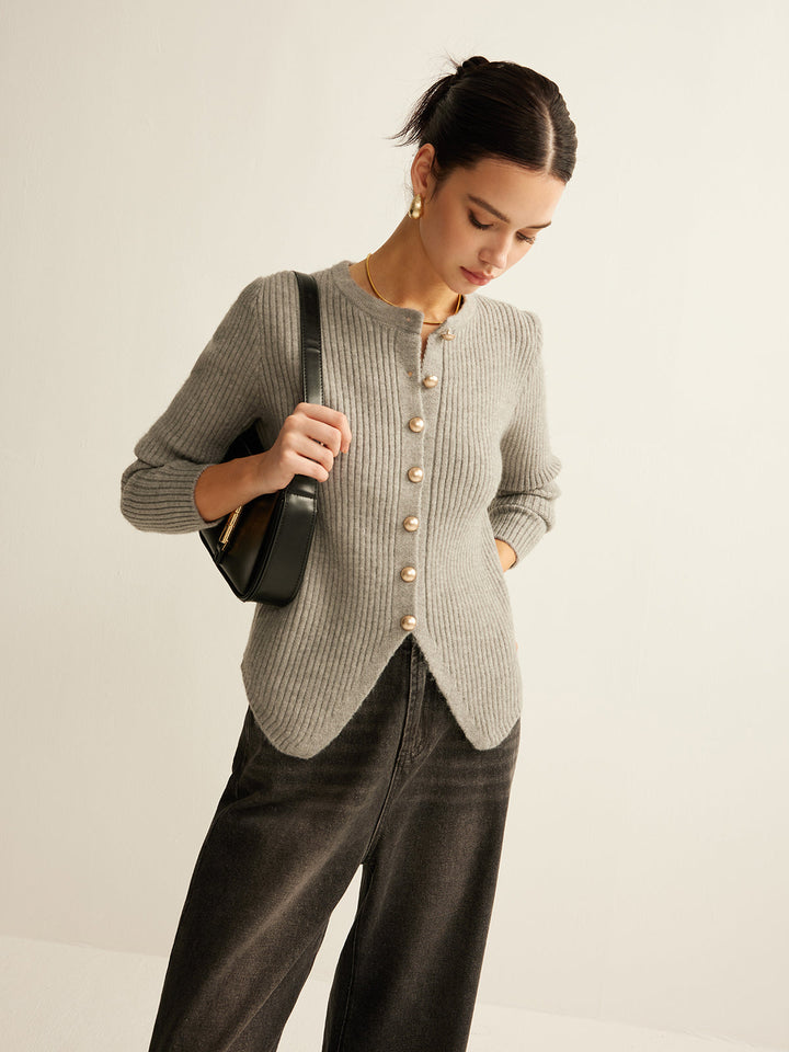 Versatile long-sleeve women's knit pullover, featuring stylish buttons; ideal for fashion-forward layering.