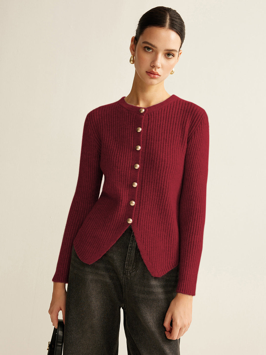 Stylish women's pullover with unique button details, a versatile knit top for an elegant casual chic outfit.