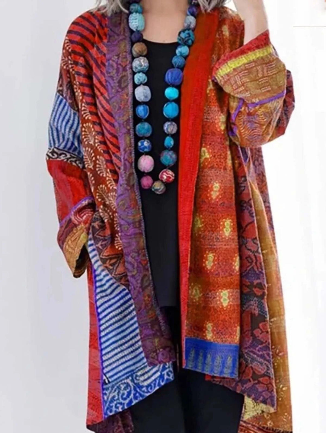 Stylish women's knit vest. Comfortable and versatile sleeveless top for elegant layering and casual outfits.