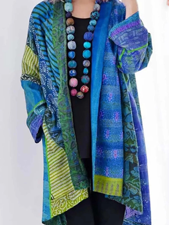 Seraphina women's elegant knit vest. Lightweight, comfortable cotton for a chic, fashionable layering piece.