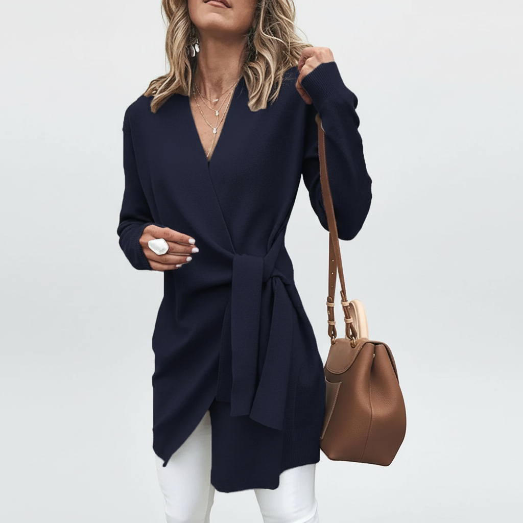 Model wearing an elegant knit cardigan with belt, suitable for winter essentials & stylish outerwear.