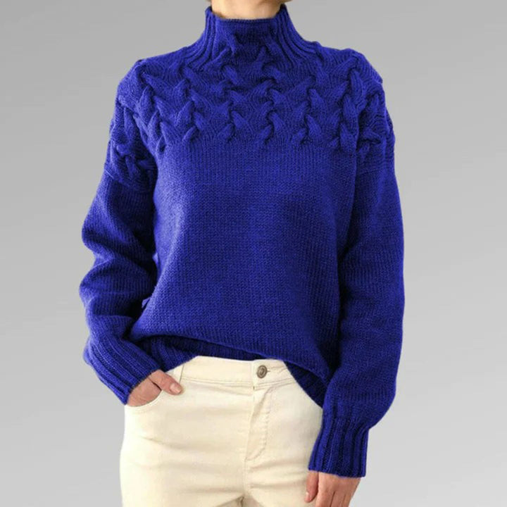 Women's elegant & cozy knitted turtleneck sweater. Stylish long sleeve winter top for chic comfort.