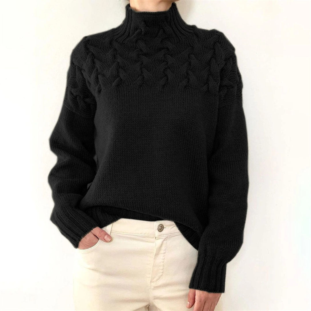 Comfortable women's knitted turtleneck sweater. Warm long sleeve top for elegant winter fashion and coziness.