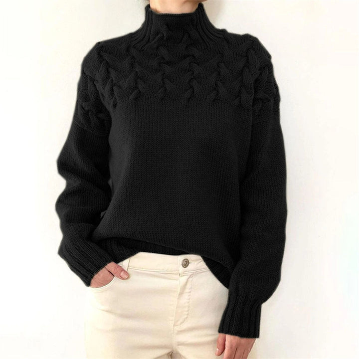 Comfortable women's knitted turtleneck sweater. Warm long sleeve top for elegant winter fashion and coziness.