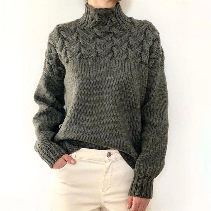 Fashionable women's knitted turtleneck sweater. Cozy winter wear long sleeve top, for chic and elegant looks.