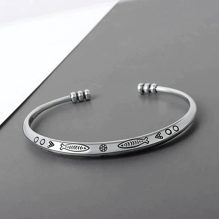 Elegant women's koi fish prosperity bracelet, symbolizing fortune & good luck. Stainless steel, adjustable fit.
