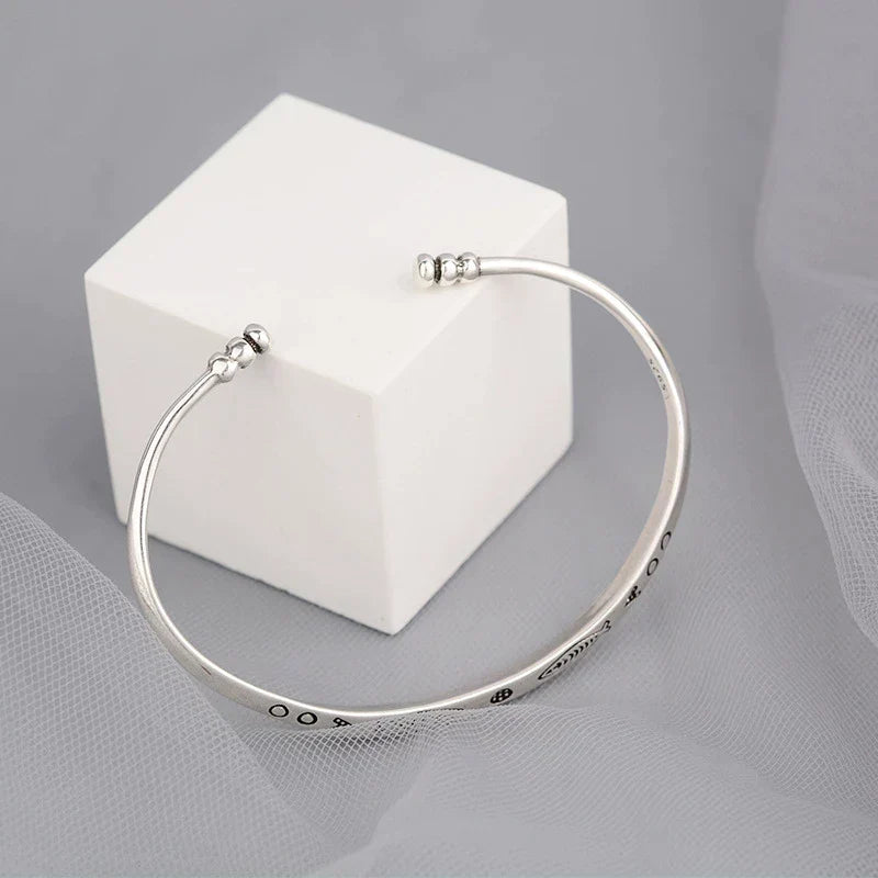 Stylish women's koi fish bracelet, crafted from stainless steel. Elegant & symbolic prosperity jewelry.