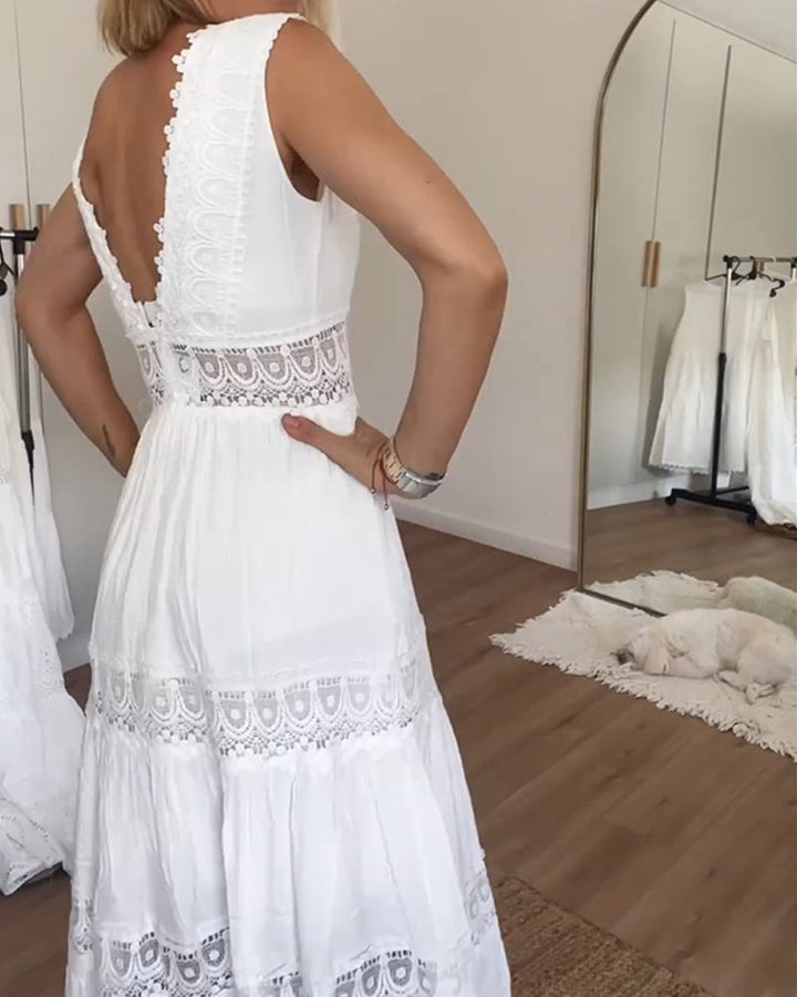 Close-up of delicate lace fabric on elegant women's midi dress, perfect summer special occasion wear.