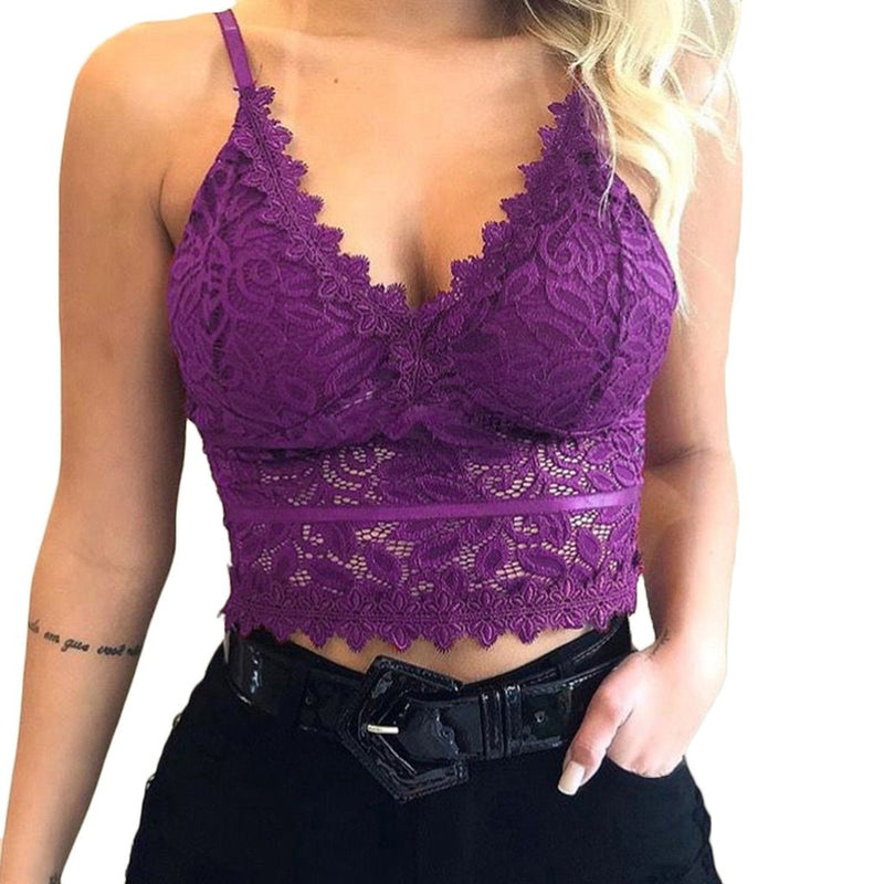 Close-up of the delicate lace detail on an elegant women's spaghetti strap top, ideal for evening wear.